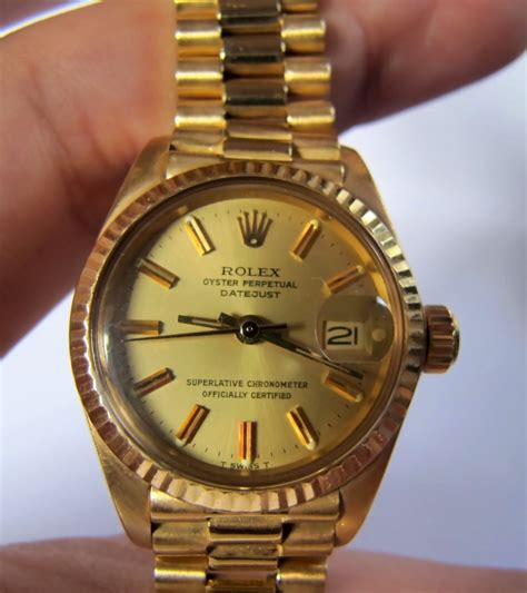 rolex feminino dourado|rolex feminino.